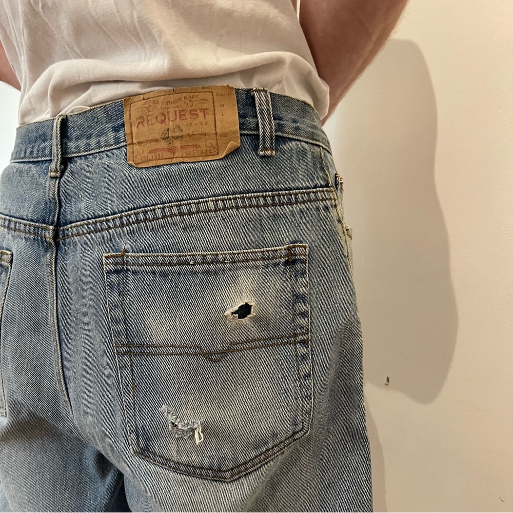 Relaxed Light Blue Men's Jeans with Subtle Distressing